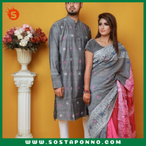 কাপল সেট (শাড়ি পাঞ্জাবি এবং বেবি পাঞ্জাবি) বিবরণ: এই কাপল সেটটি সম্পূর্ণ পরিবারের জন্য উপযুক্ত এবং বিশেষ দিনে আপনাদের পুরো পরিবারের সাজকে করে তুলবে আকর্ষণীয় ও স্মরণীয়। বিশেষ করে ঐতিহ্যবাহী ও আরামদায়ক হাফ সিল্ক এবং ধুপিয়ান কটনের কাপড় দিয়ে তৈরি এই কাপল সেটের প্রতিটি টুকরো আপনাকে অনন্যতার অনুভূতি দেবে। প্রিয়জন এবং ছোট্ট সোনামণির জন্য এমন অনন্য ডিজাইনের একটি কাপল সেট সংগ্রহের সুযোগ হাতছাড়া করবেন না! বৈশিষ্ট্য: শাড়ি: এই হাফ সিল্ক শাড়িটি ১২ হাত লম্বা এবং হ্যান্ড প্রিন্টের কারুকাজে সমৃদ্ধ। সিল্কের মসৃণ স্পর্শ এবং হ্যান্ড প্রিন্টের নান্দনিকতা, শাড়িটিকে আরও মনোমুগ্ধকর করে তোলে। এটি যে কোনো উৎসব বা বিশেষ দিনের জন্য একদম মানানসই, যেখানে আপনি হয়ে উঠবেন সবার মধ্যমণি। এই শাড়িটি কালার গ্যারান্টিসহ দেয়া হয়েছে, তাই এটি ব্যবহারে রঙের উজ্জ্বলতা বজায় থাকবে বহুদিন। পুরুষদের পাঞ্জাবি: ধুপিয়ান কটনের তৈরি এই পাঞ্জাবিটি হ্যান্ড প্রিন্টের কাজের জন্য বিশেষভাবে তৈরি। কটনের আরামদায়ক এবং শীতল স্পর্শ প্রতিটি দিনেই আপনার আরামকে বাড়িয়ে তুলবে। বিশেষ করে যেকোনো পারিবারিক অনুষ্ঠান বা মিলনমেলায় এটি আপনাকে ঐতিহ্যবাহী ও স্টাইলিশ লুক দেবে। বেবি পাঞ্জাবি: আপনার ছোট্ট সোনামণির জন্য এই আরামদায়ক ধুপিয়ান কটনের পাঞ্জাবিটি একদম উপযুক্ত। বাচ্চাদের ত্বকের জন্য উপযোগী এবং আরামদায়ক এই পাঞ্জাবিটি দেখতে যেমন সুন্দর তেমনই তার জন্য মিষ্টি লুক এনে দেবে। এর হ্যান্ড প্রিন্ট কাজের কারুকাজ তাকে সবার মাঝে আলাদা করে তুলবে। কালার গ্যারান্টি: প্রতিটি পোশাকেই রয়েছে কালার গ্যারান্টি, যা বহুদিন ব্যবহারের পরও উজ্জ্বলতা এবং রঙের স্থায়িত্ব বজায় রাখবে। তাই আপনি নিশ্চিত থাকতে পারেন যে, এই কাপল সেটটি দীর্ঘদিন ধরে তার রঙ ও মান বজায় রাখবে। বিশেষত্ব: এই কাপল সেটটি এমনভাবে তৈরি করা হয়েছে যাতে পুরো পরিবারের জন্য একটি সুন্দর ঐক্যপূর্ণ লুক প্রদান করে। ঐতিহ্যবাহী পোশাকের সৌন্দর্য এবং আধুনিক ডিজাইনের সংমিশ্রণ এই সেটকে সকল বয়সের জন্য মানানসই করে তুলেছে। আপনার পরিবারকে ঐতিহ্য ও ভালোবাসার বন্ধনে আবদ্ধ করে বিশেষ দিনগুলোতে তাদের অনন্য রূপে গড়ে তুলুন। অর্ডার করতে দেরি করবেন না—এখনই অর্ডার করে পুরো ফ্যামিলির জন্য এই বিশেষ কাপল সেটটি সংগ্রহ করুন এবং প্রতিটি মুহূর্তকে আরো রঙিন ও স্মরণীয় করে তুলুন!